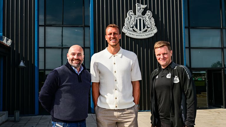Paul Mitchell (left) depicted with Dan Burn (Center) and Eddie Howe after the defender signed a new deal on Newcastle