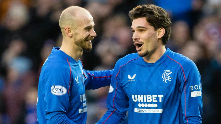Glasgow, Scotland -February 2: Rangers' Ianis Hagi (R) celebrates scoring to do it 2-0 with teammate Vaclav Cerny under a William Hill PremiSHIP match between Rangers and Ross County at Ibrox Stadium, February 2, 2025, in Glasgow, Scotland. (Photo by Alan Harvey / SNS Group)