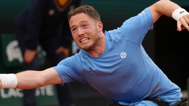 Alfie Hewett reaches out for a shot against Japan's Tokito Oda during their Lord's wheelchair single final at the French Open